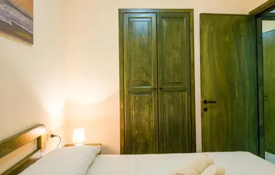 Letto o letti in una camera di Casa Bella Vista