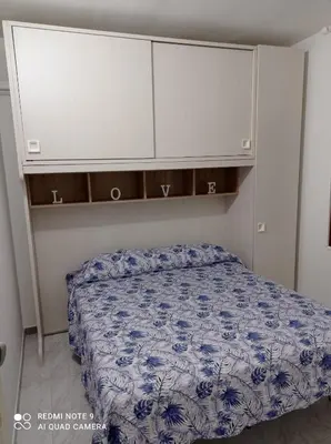 Letto o letti in una camera di Tortolì-Porto Frailis-Arbatax