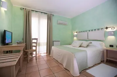 Letto o letti in una camera di S'Anninnia