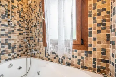 Bagno di La Casa della Marea Tra cielo e Terra