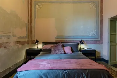 Letto o letti in una camera di Ladiri - Antica dimora in terra cruda