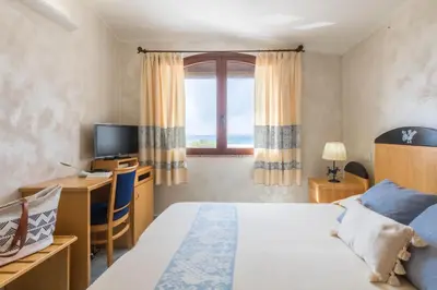 Letto o letti in una camera di Hotel Villa del Mare Solanas