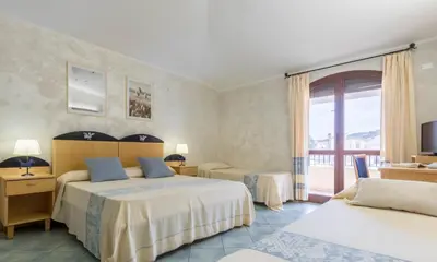 Letto o letti in una camera di Hotel Villa del Mare Solanas