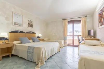 Letto o letti in una camera di Hotel Villa del Mare Solanas