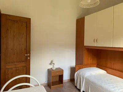 Letto o letti in una camera di Villa Magnolia
