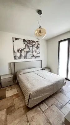 Letto o letti in una camera di HomeStyle Agorà