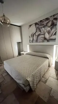 Letto o letti in una camera di HomeStyle Agorà