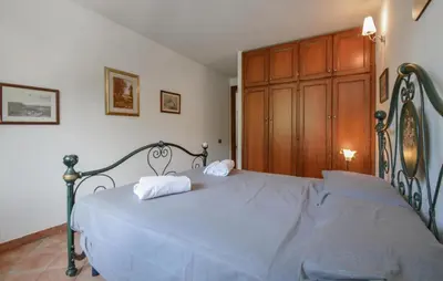 Letto o letti in una camera di Secca 2