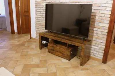 TV o dispositivi per l'intrattenimento presso Holiday Home Virgilio House