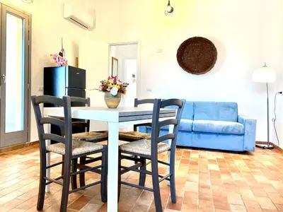 Area soggiorno di Le Corti Sarde Apartments