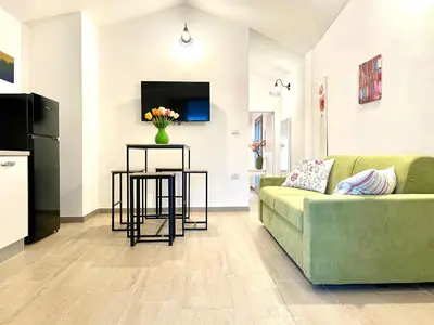 TV o dispositivi per l'intrattenimento presso Le Corti Sarde Apartments
