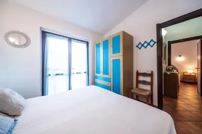 Letto o letti in una camera di Villa Nicola