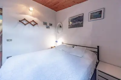 Letto o letti in una camera di Villa Maria Lina