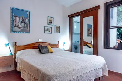 Letto o letti in una camera di Villa Monica