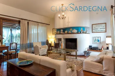 Area soggiorno di Villa right on the beach a Santa Margherita di Pula for 12 people