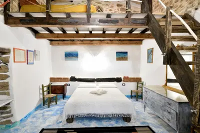 Letto o letti in una camera di La Pergola