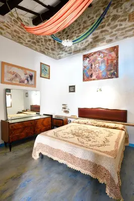 Letto o letti in una camera di La Pergola