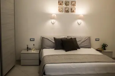 Letto o letti in una camera di La Casetta