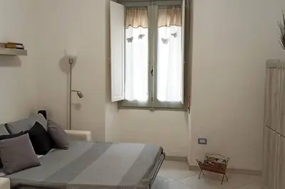 Letto o letti in una camera di La Casetta