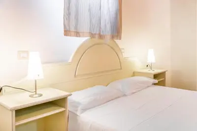 Letto o letti in una camera di bilocale Pinewood