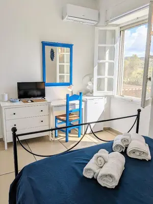 Letto o letti in una camera di Villa Uliveto apartments