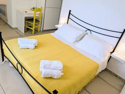 Letto o letti in una camera di Villa Uliveto apartments