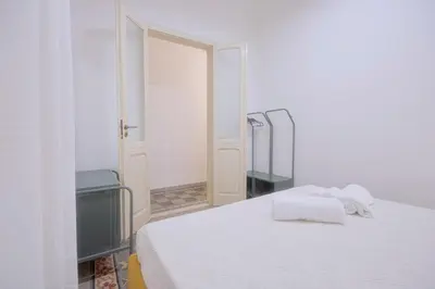 Letto o letti in una camera di Right House via Sulis 23 - Best Neighborhood in Town