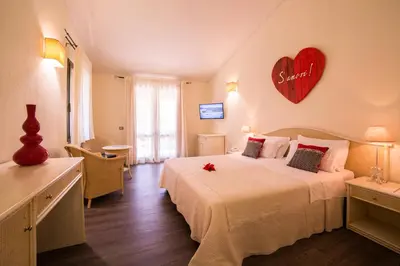 Letto o letti in una camera di Albaruja Hotel