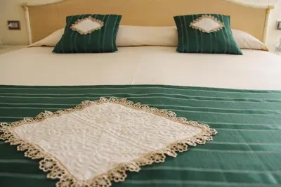 Letto o letti in una camera di Albaruja Hotel