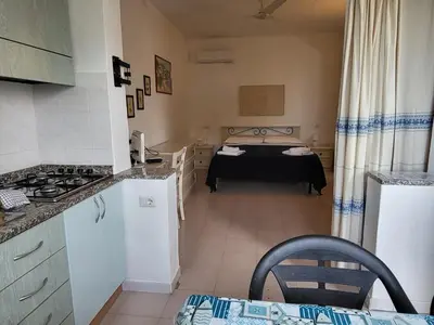 Letto o letti in una camera di Villetta Sunrise Colibrì