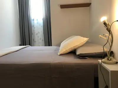 Letto o letti in una camera di A due passi dalla città