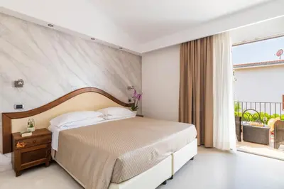 Letto o letti in una camera di Hotel Nicoletta
