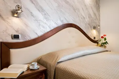 Letto o letti in una camera di Hotel Nicoletta