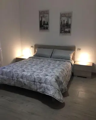 Letto o letti in una camera di Domus Alice