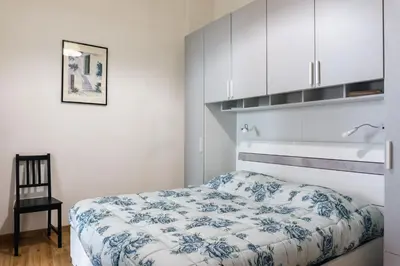 Letto o letti in una camera di La Casetta