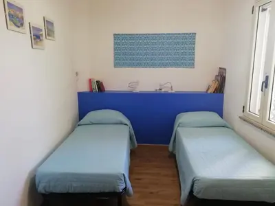 Letto o letti in una camera di La Casetta
