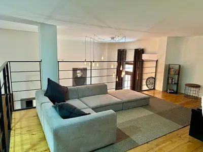Letto o letti in una camera di My exclusive cavour loft da sogno a cagliari