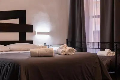 Letto o letti in una camera di My exclusive cavour loft da sogno a cagliari