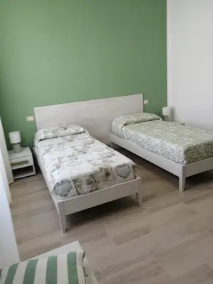 Letto o letti in una camera di Sa Banita affittacamere
