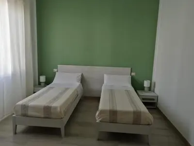Letto o letti in una camera di Sa Banita affittacamere