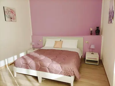 Letto o letti in una camera di Sa Banita affittacamere