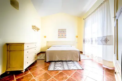 Letto o letti in una camera di Borgo Degli Ulivi