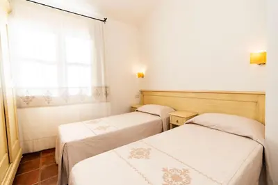 Letto o letti in una camera di Borgo Degli Ulivi