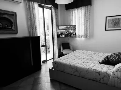 Letto o letti in una camera di L’ESSENZIALE