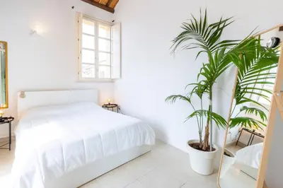 Letto o letti in una camera di Castello Attic Sunset Terrace