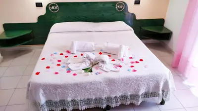 Letto o letti in una camera di Hotel Mater Mediterranea