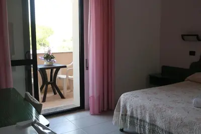 Letto o letti in una camera di Hotel Mater Mediterranea