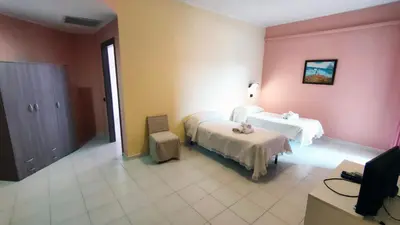 Letto o letti in una camera di Hotel Mater Mediterranea