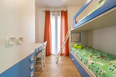 Letto o letti in una camera di Casa Sofia