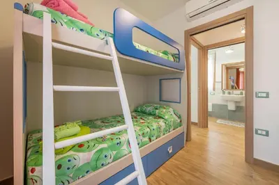 Letto o letti in una camera di Casa Sofia